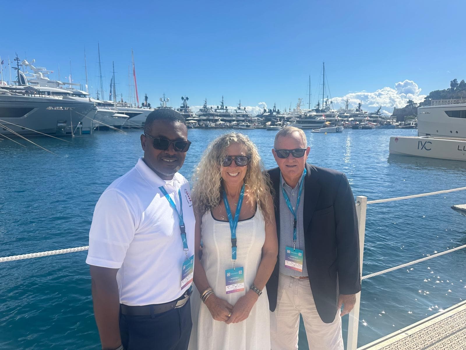 United Island & Yacht team members dockside at a superyacht show